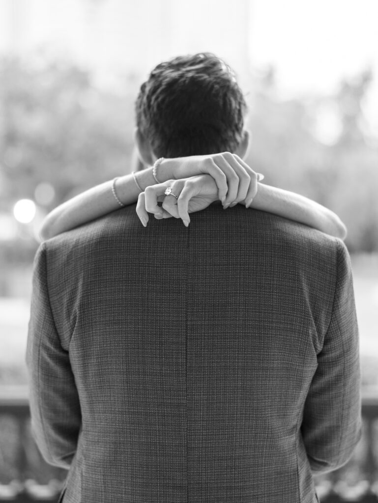 Soft and intimate moment in front of classic architecture in Tampa engagement photo