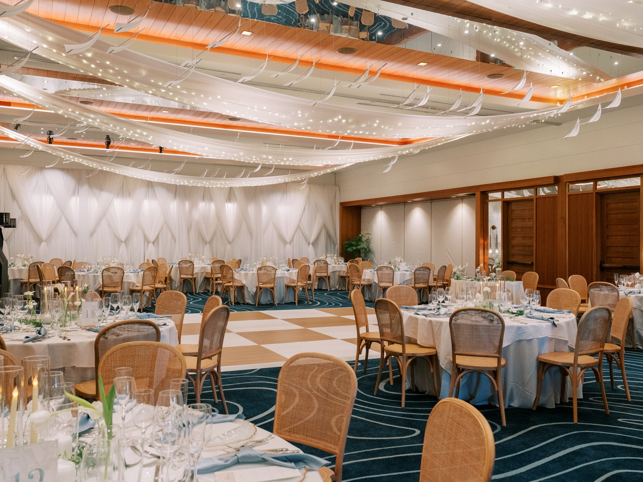 Indoor wedding reception setup at The Resort at Longboat Key Club