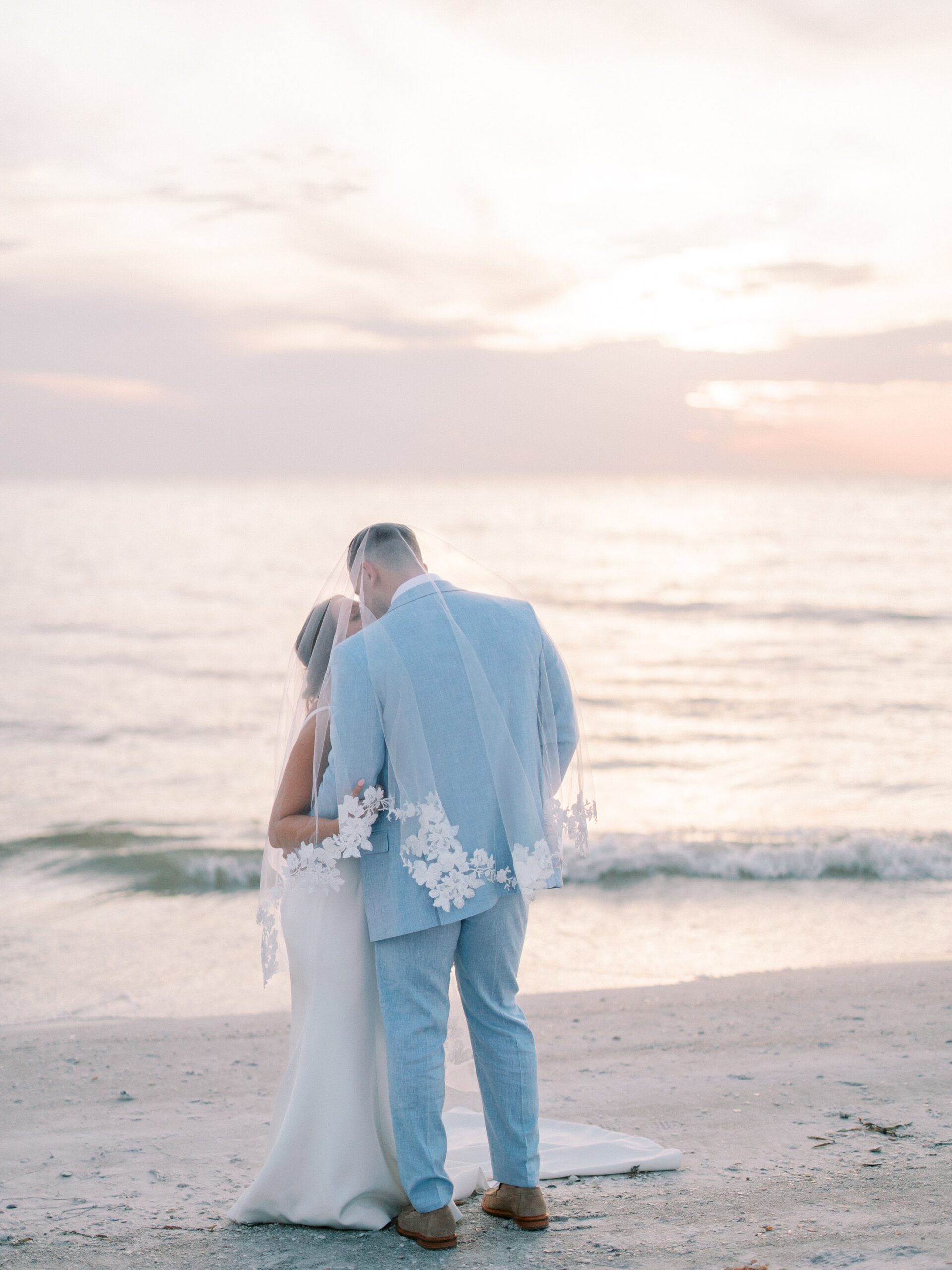 Sunset wedding portraits on South Beach at The Resort at Longboat Key Club